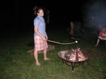 Amber (so enthused) roasting marshmallows