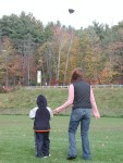 Erik flying his new kite with Mom.jpg