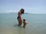 Amber and Erik on the beach in Maenam behind bungalows