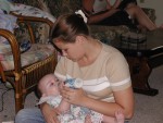 Auntie Amber feeding Anna