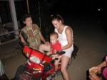 Erik and Amber posed on motorbike