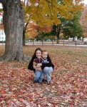 Mommy and Erik surrounded by fall leaves cropped